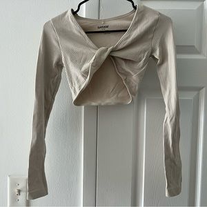Cropped garage long sleeved top